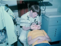 Sharpening my dental skills. Dr. Abbott treating patient